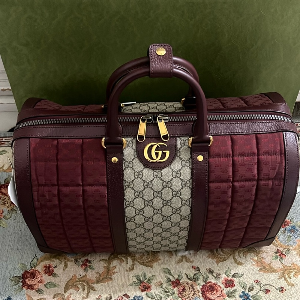 Beautiful Gucci luggage travel duffel